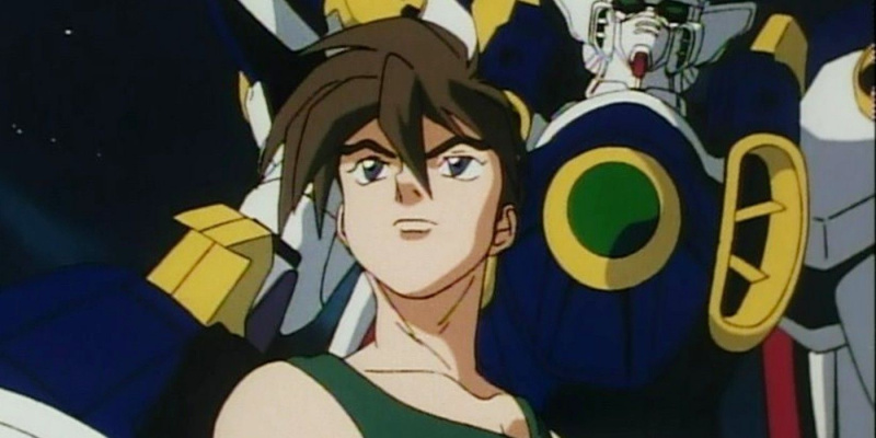   Heero se tient devant son Gundam dans l'aile Gundam