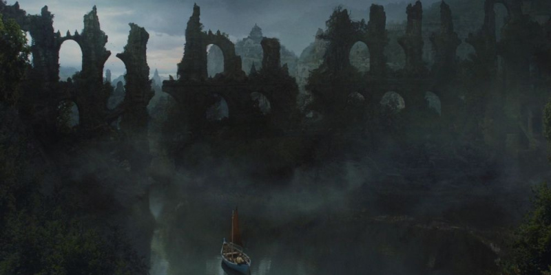   Tyrion og Jorah seiler forbi ruinene av Valyria i Game of Thrones.