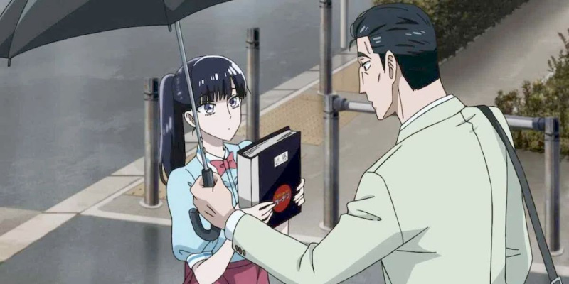  Akira egy nagy könyvet tart a kezében, Masami pedig egy esernyőt tart neki az Eső után című filmben.